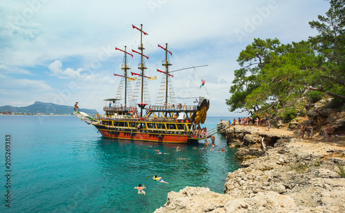 Canvas Print ancient pirate ship by the shore. Turkey