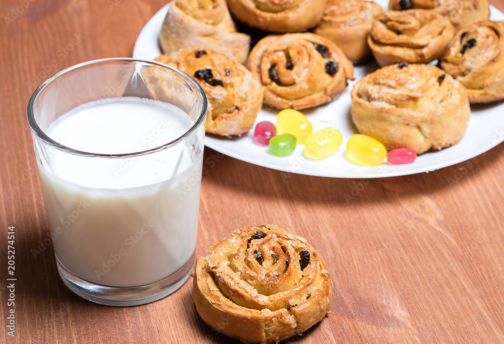 cookies baked at home by an amateur, next glass of milk cookies baked at home by an amateur, next glass of milk