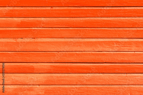 Orange painted wooden background, texture or wall