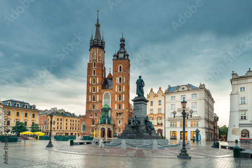 Krakow, Poland - The Church of Mary and the Monument in the Main Square of the City