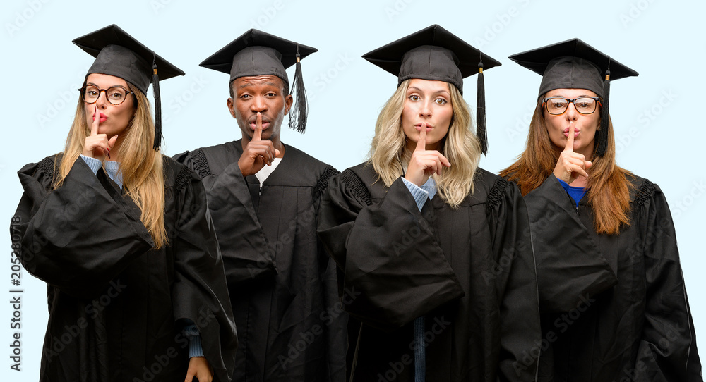 Education concept, university graduate woman and man group with index finger on lips, ask to be quiet. Silence and secret concept Education concept, university graduate woman and man group with index finger on lips, ask to be quiet. Silence and secret concept