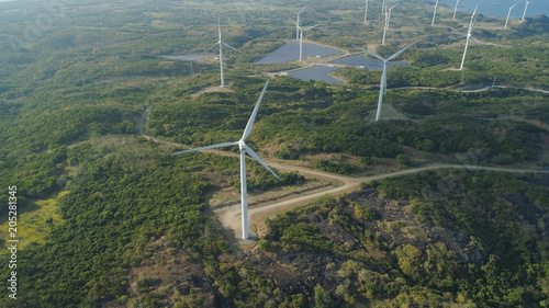 Aerial view of Windmills for electric power production. Bangui Windmills in Ilocos Norte, Philippines. Solar farm, Solar power station.