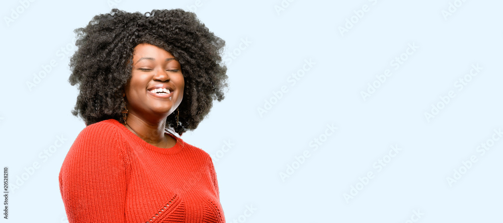 Beautiful african woman confident and happy with a big natural smile ...