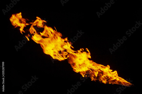 Fire, flame on a black background. Fire for advertising. An unusual game of bright red and yellow colors. © AKlion