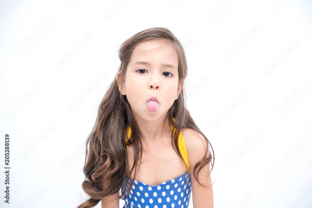 Young girl isolated white. Pretty early teenage girl portrait. Happy naughty pose. Young girl isolated white. Pretty early teenage girl portrait. Happy naughty pose.