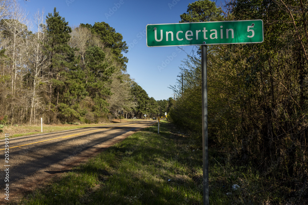 Road sign to Uncertain Texas
