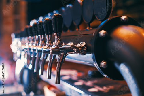 Beer tap array in beer bar