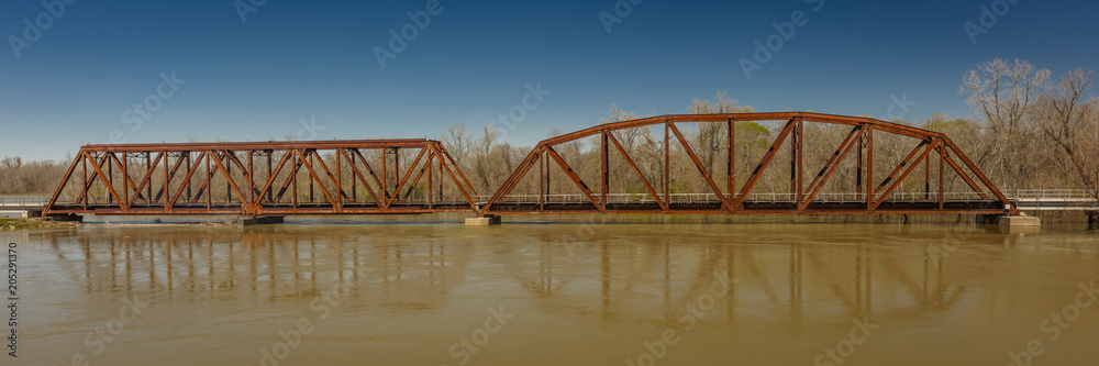 Iron Railroad Bridge over water, Texas
