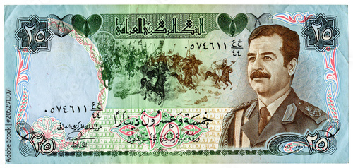 Vintage Iraq banknote with Saddam Hussein portrait