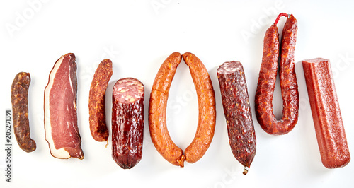 Line of assorted spicy seasoned sausages