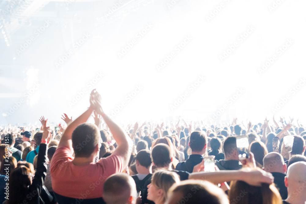 Crowd at a concert with hands up Crowd at a concert with hands up