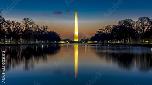 APRIL 8, 2018 - WASHINGTON D.C. - Washington Monument and reflecting pond at sunrise, Washington D.C.