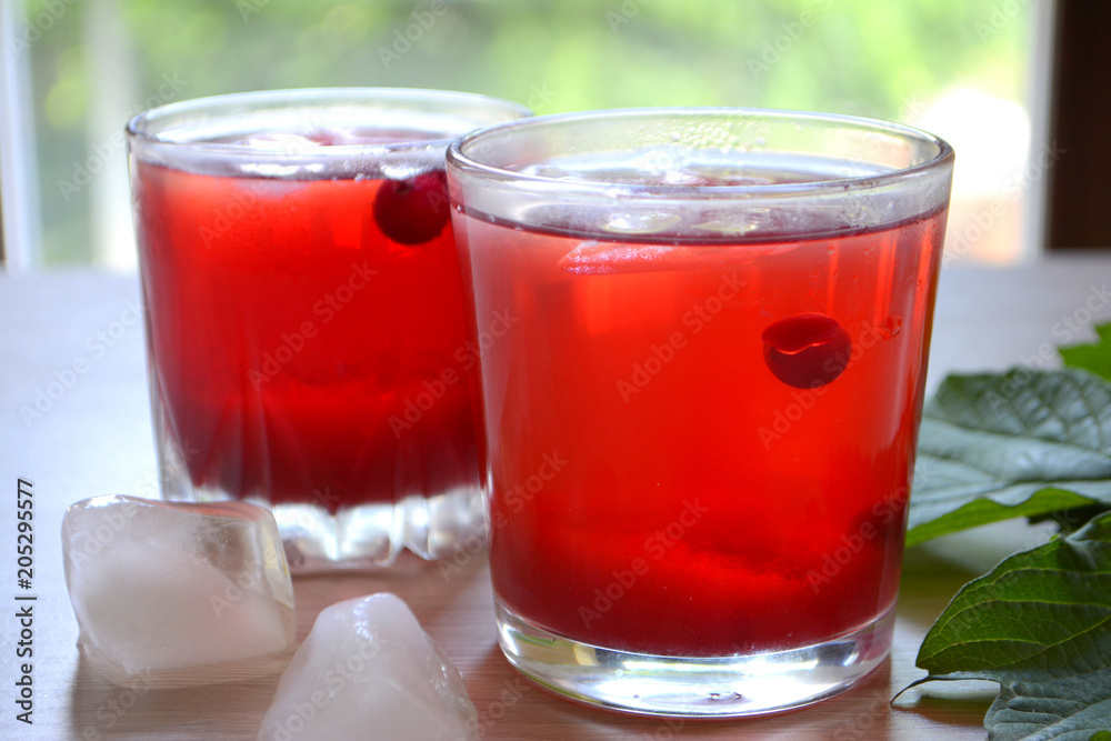 Cranberry juice or lemonade. Red refreshing drink Cranberry juice or lemonade. Red refreshing drink
