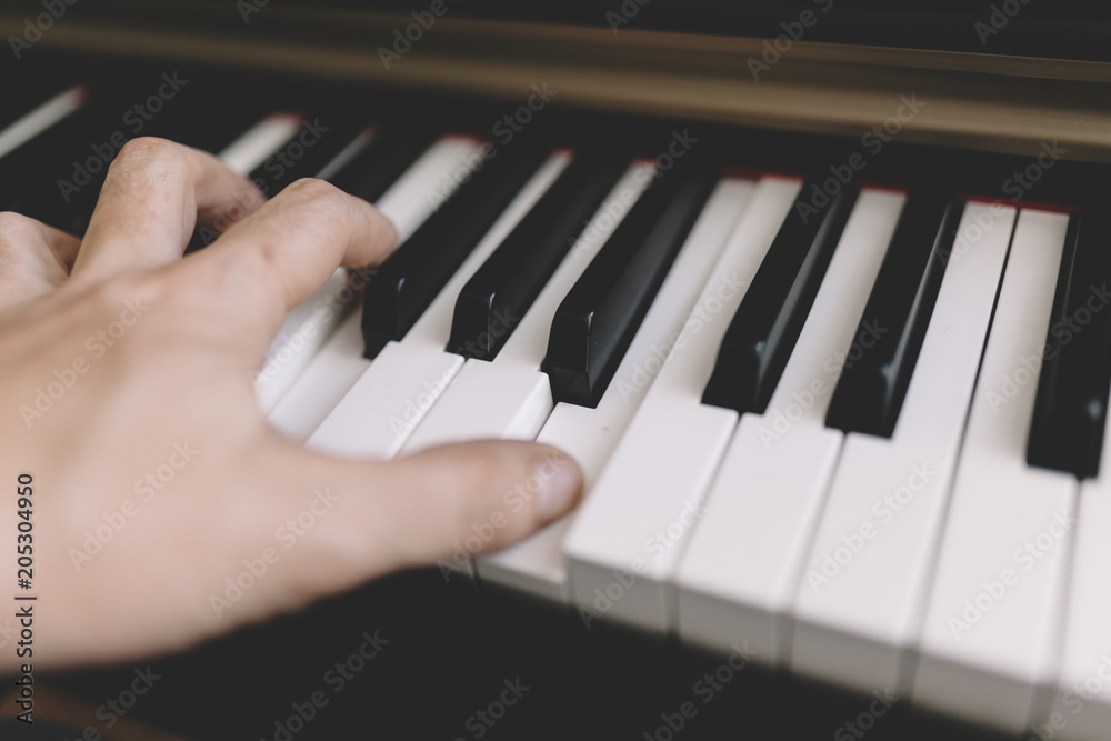Fototapeta premium Hands on piano