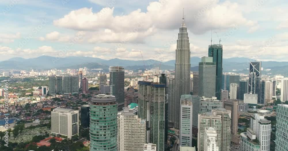 Aerial view of Kuala Lumpur downtown. Skylines and Petronas tower - October 2017. Kuala Lumpur, Malaysia Aerial view of Kuala Lumpur downtown. Skylines and Petronas tower - October 2017. Kuala Lumpur, Malaysia