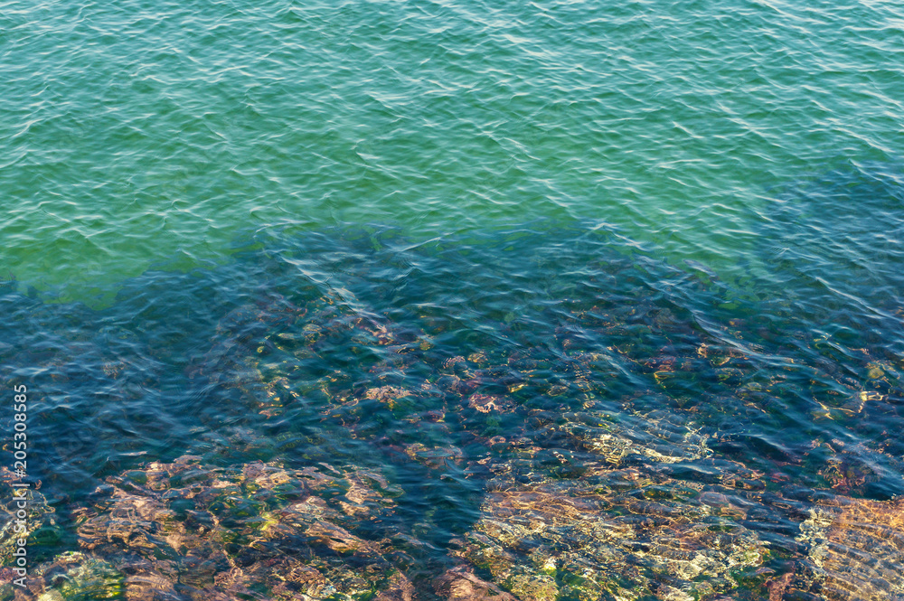 Fototapeta premium Clear, transparent water and rocks nature background