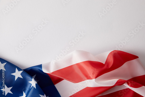 elevated view of united states of american flag on white surface