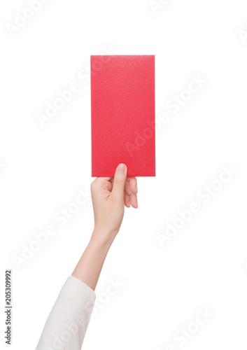 hand holding a red envelope