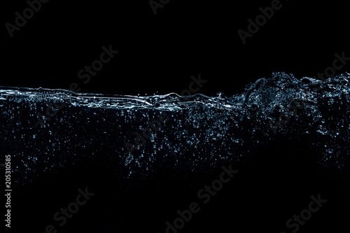 close up view of clean water splash isolated on black