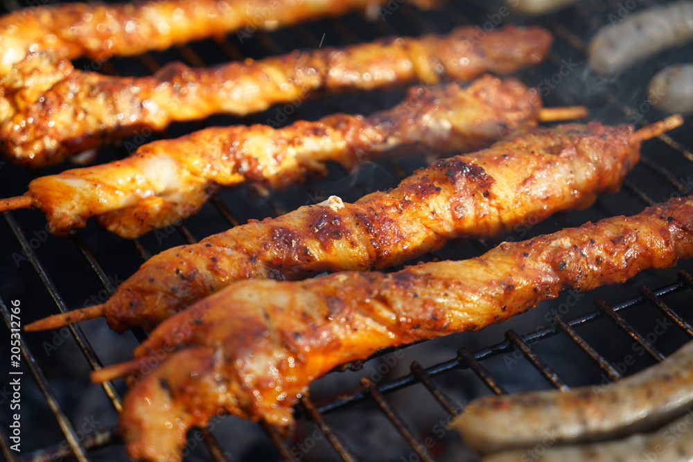 Sausages barbecue with a charcoal barbecue in the garden

