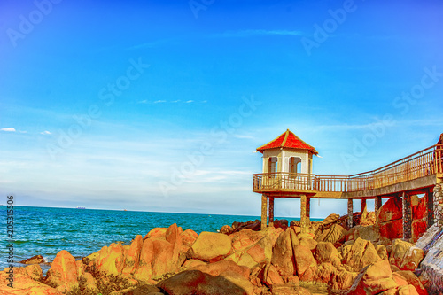 Aerial view of Quy Nhon beach with curved shore line in Binh Dinh province, Vietnam photo