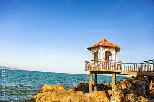 Aerial view of Quy Nhon beach with curved shore line in Binh Dinh province, Vietnam photo