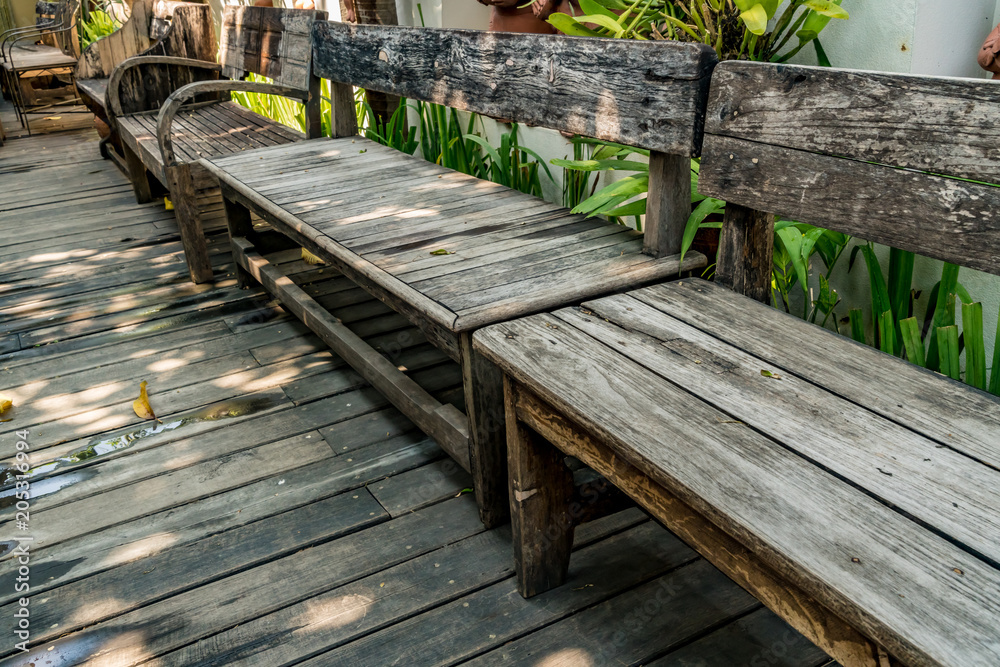 Wood bench on concrete floor Wood bench on concrete floor