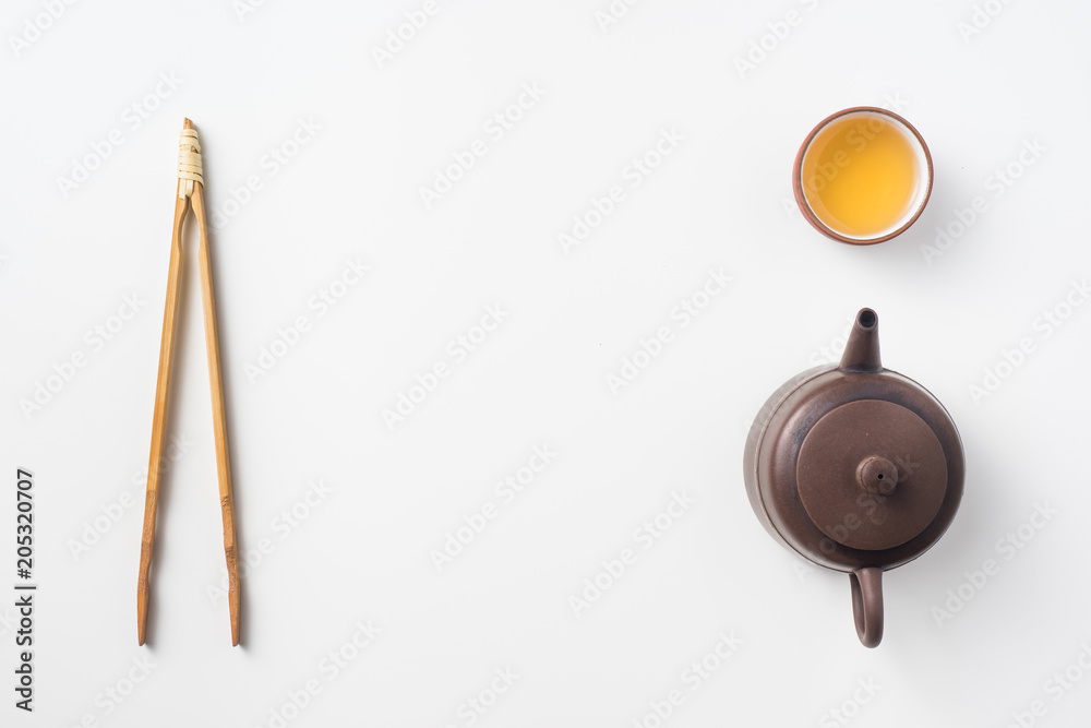 Asia culture and design concept - fresh taiwan oolong tea and teapot Asia culture and design concept - fresh taiwan oolong tea and teapot