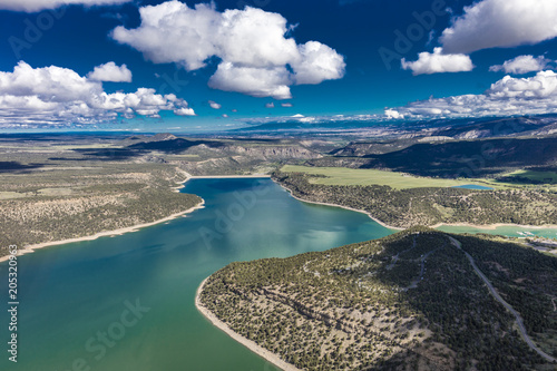 April 27, 2017 RIDGWAY COLORADO - Aerial of Ridgway State Park and Reservoir, Ridgway Colorado with white puffy clouds photo