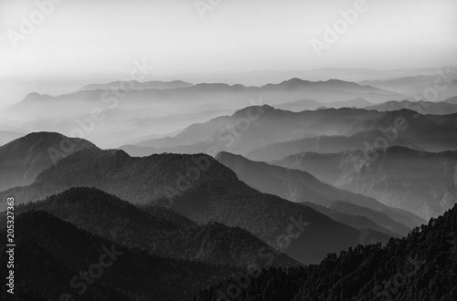 Valley and mountains in black and white photo