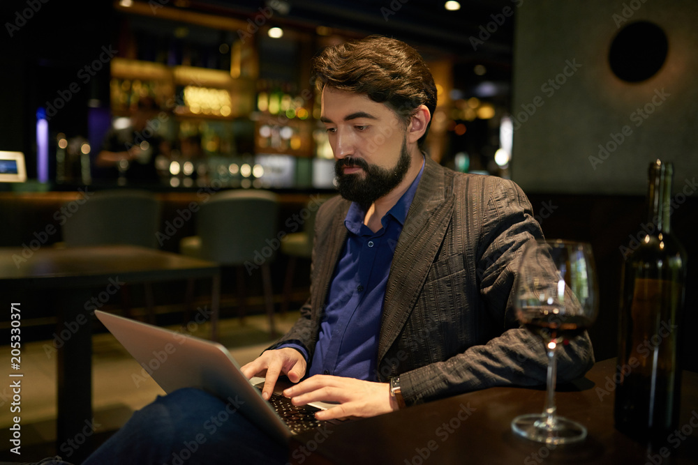 Working and drinkig wine Working and drinkig wine