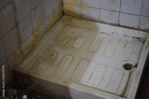 repair in the old house, old broken walls and the ceiling in the toilet