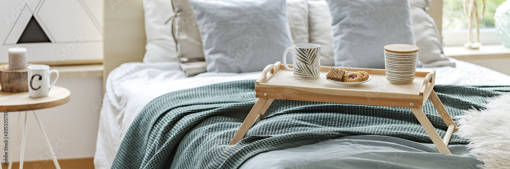 Wooden breakfast tray on bed - obrazy, fototapety, plakaty 