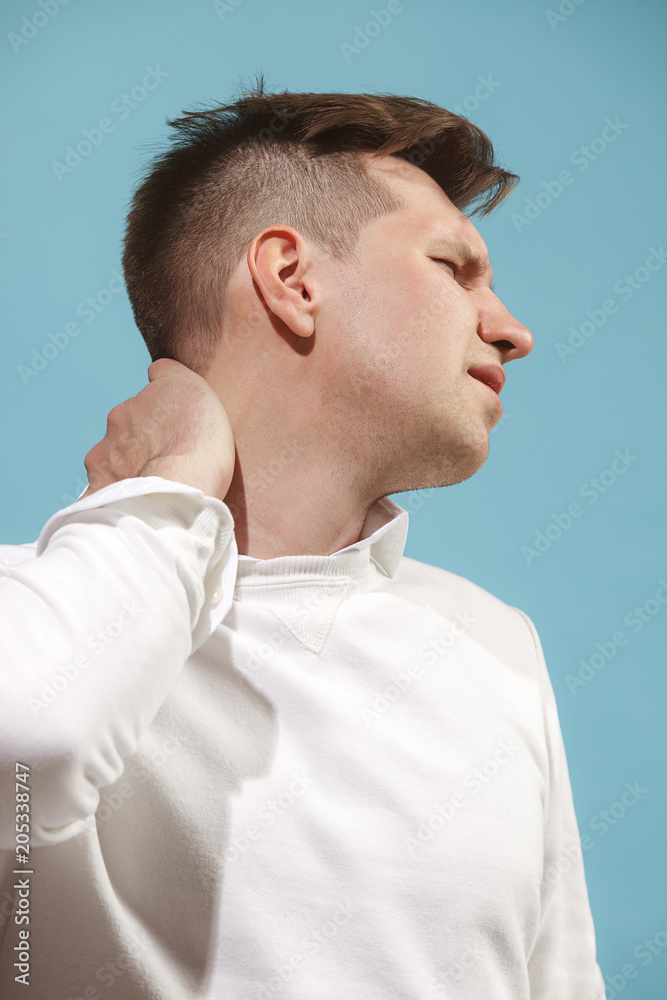Beautiful bored man isolated on studio background Beautiful bored man isolated on studio background