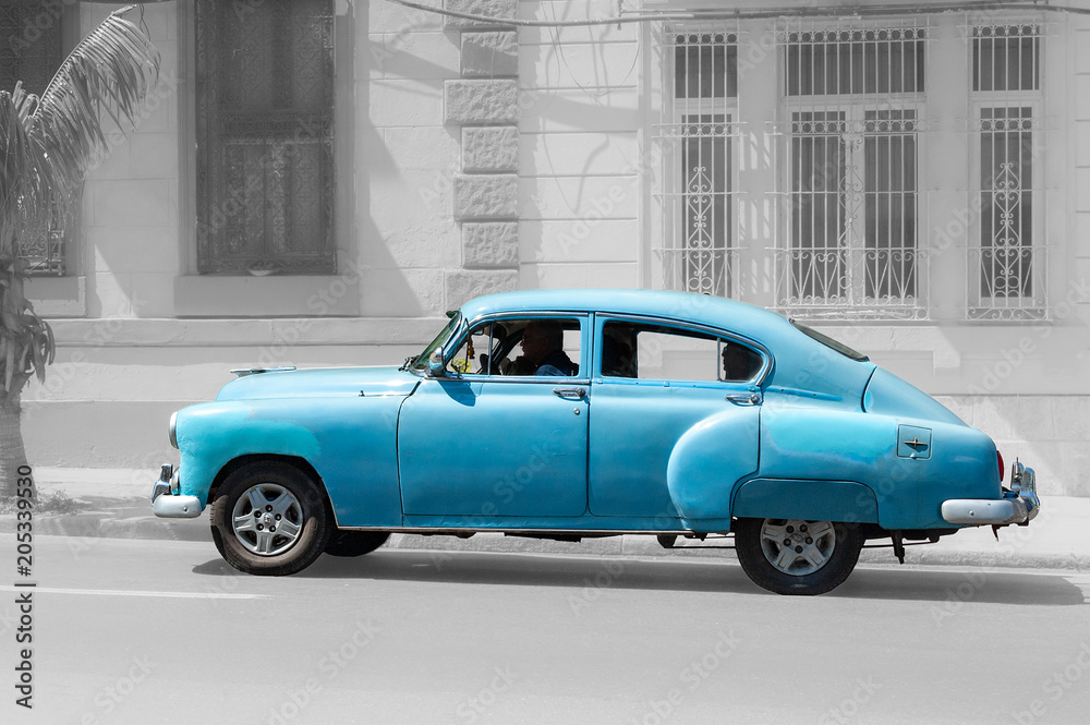 Old Cuban taxi in Havana streets
