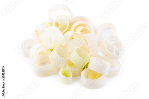 Fresh green leek chopped rings isolated on a white background