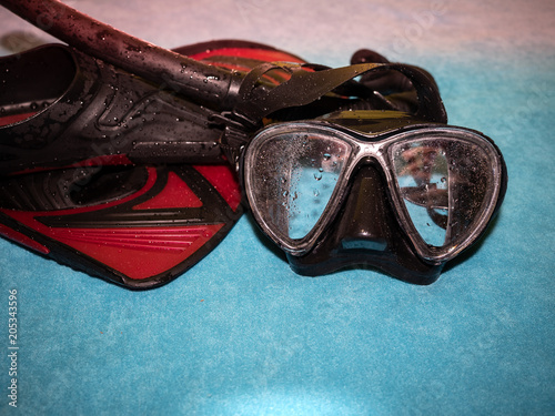 Close-up of snorkeling equipment. Diving goggles and fins.
