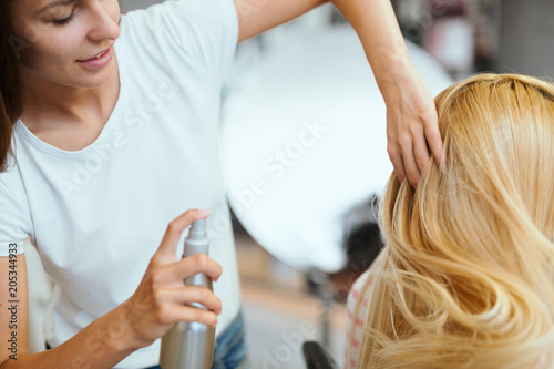 Happy woman at the hair salon