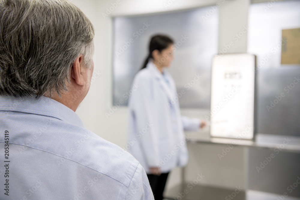 Opitcian with patient. Opitcian with patient.