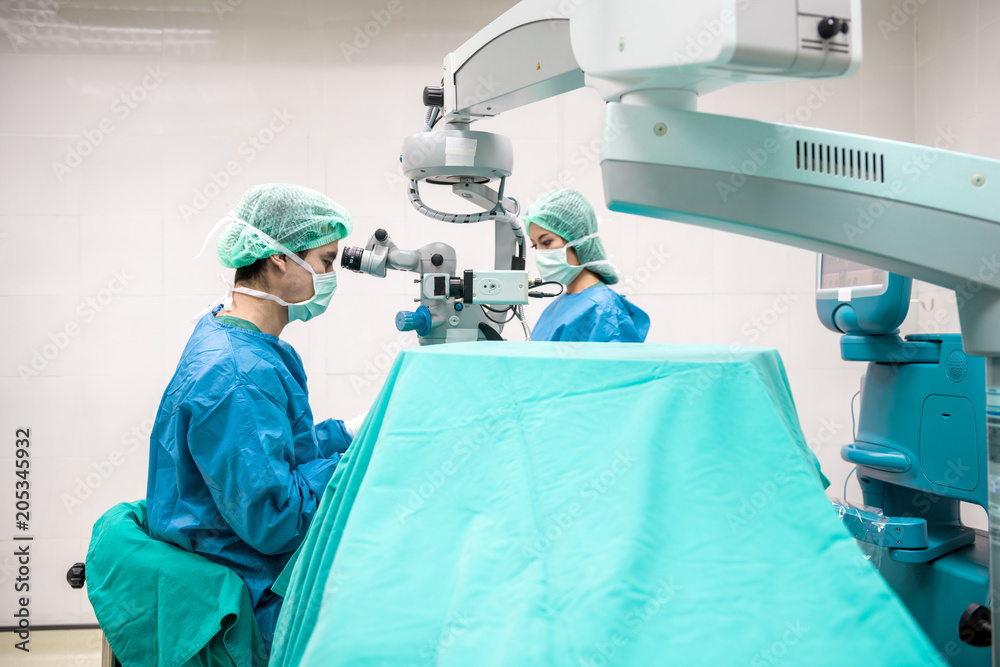 Eye surgeon at work. Eye surgeon at work.