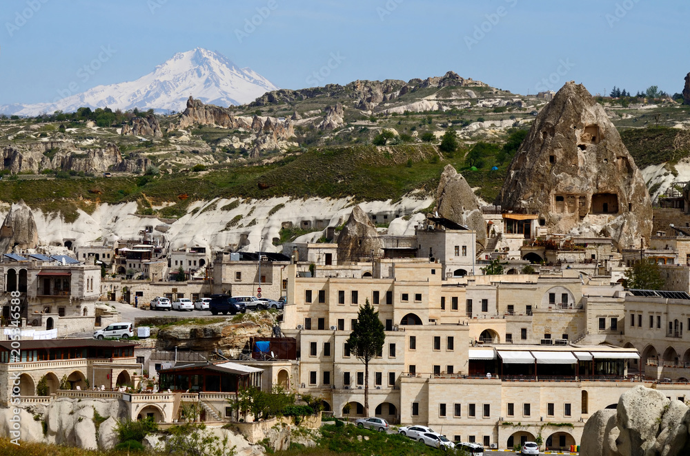 Goreme and top of mount Erciyes (ancient Argaeus) covered with the snow, Cappadocia,Turkey,Central Anatolia