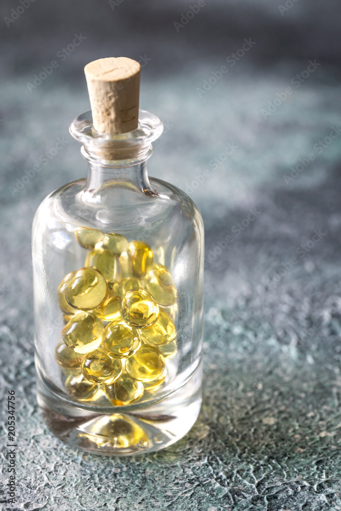 Omega-3 fish oil capsules in the glass bottle Omega-3 fish oil capsules in the glass bottle