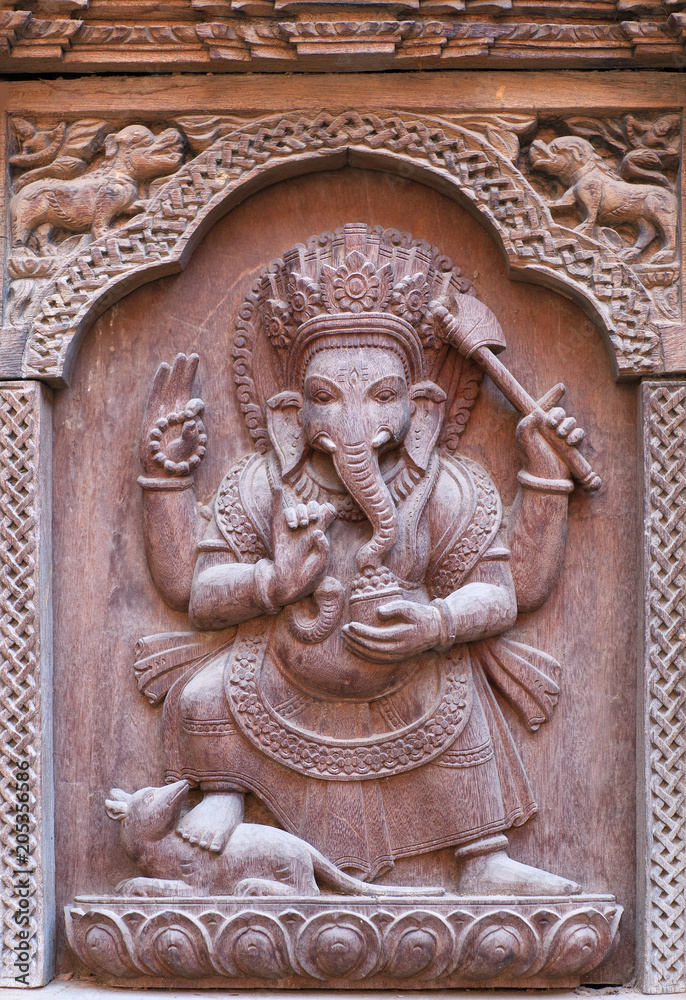 Wooden carving with Ganesha Hindu God at the palace in Patan, Nepal