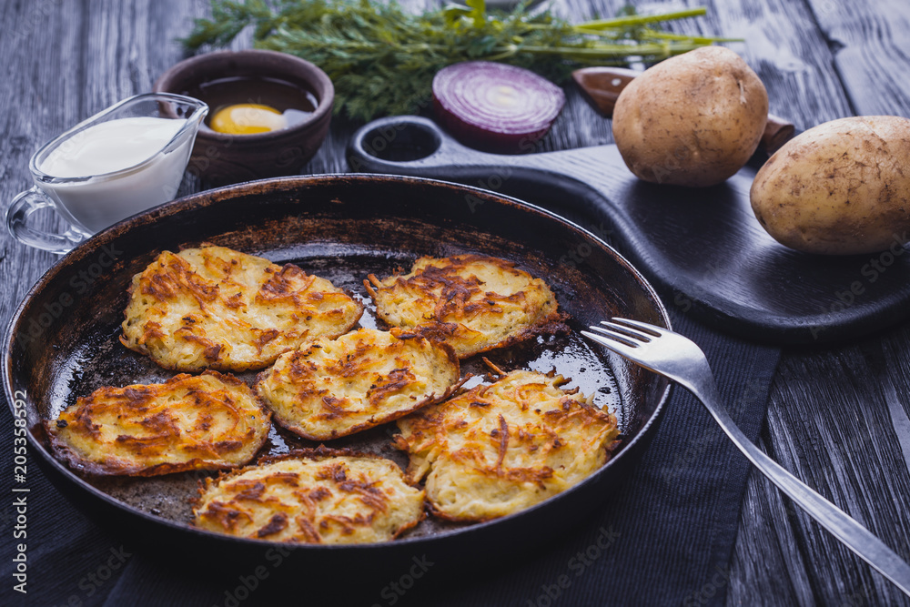 Homemade Traditional potato fritters on a Background Homemade Traditional potato fritters on a Background