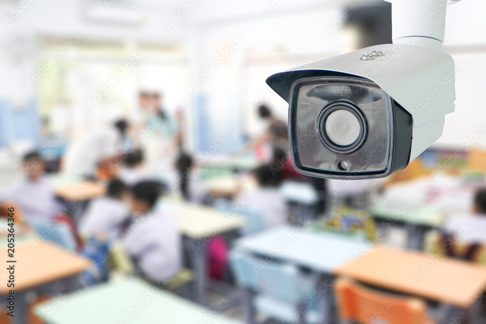 CCTV Security monitoring student in classroom at school.Security camera  surveillance for watching and protect group of children while studying.  Photos | Adobe Stock