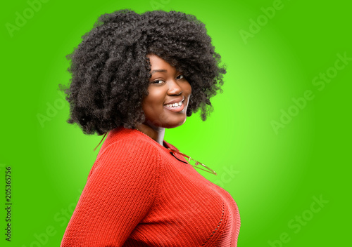 Beautiful african woman confident and happy with a big natural smile laughing