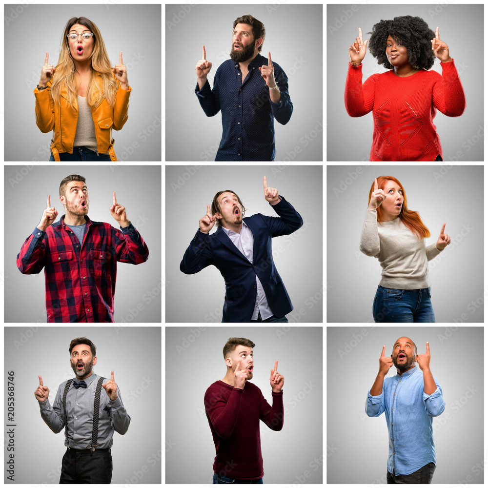 Obraz premium Group of mixed people, women and men happy and surprised cheering expressing wow gesture pointing up