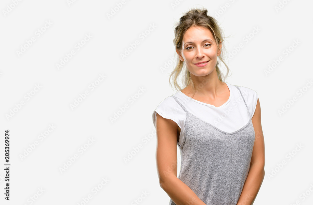 Young beautiful woman confident and happy with a big natural smile laughing Young beautiful woman confident and happy with a big natural smile laughing