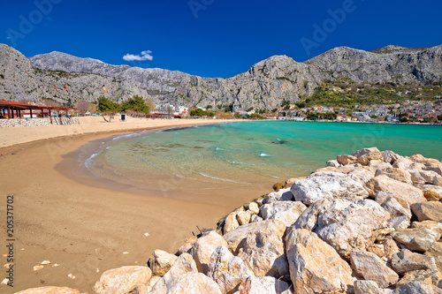 Town of Omis sand beach and Biokovo mountain coastline view © xbrchx