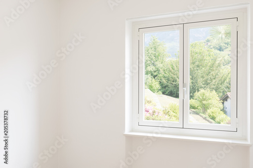 Detail of a window in a white room